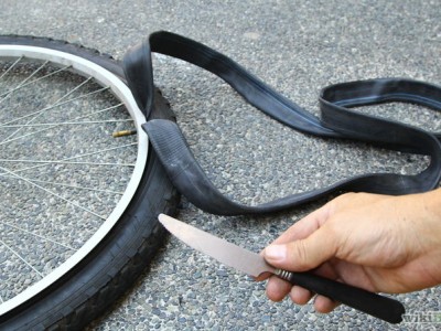 Un Vendeur Cycles en GSS parvient à changer un pneu